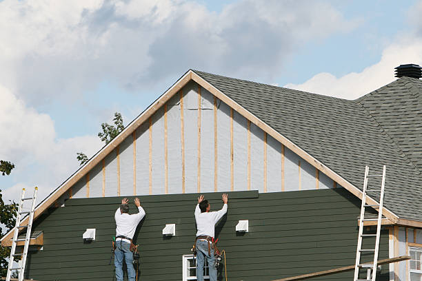 Professional Siding Replacement technician working in Hopkinton, MA